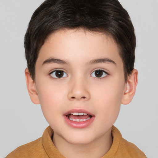 Joyful white child female with short  brown hair and brown eyes