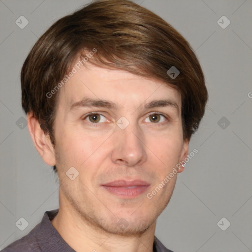 Joyful white adult male with short  brown hair and grey eyes