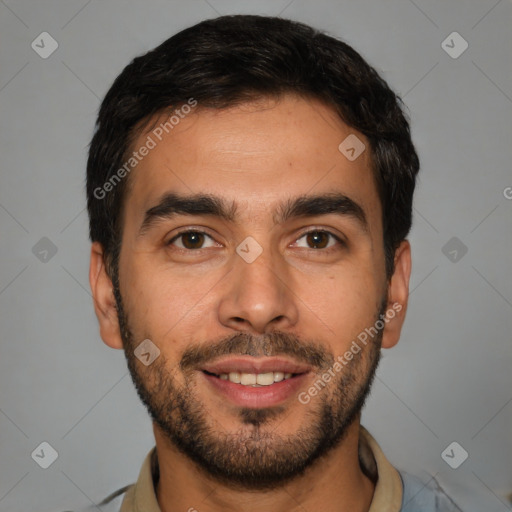 Joyful white young-adult male with short  black hair and brown eyes