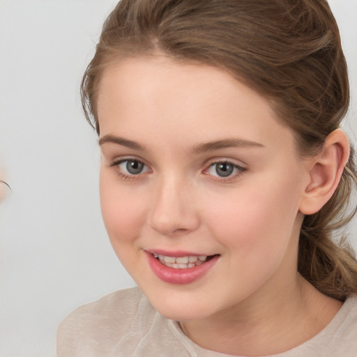 Joyful white child female with medium  brown hair and brown eyes