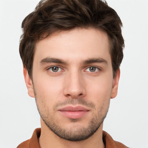 Neutral white young-adult male with short  brown hair and brown eyes