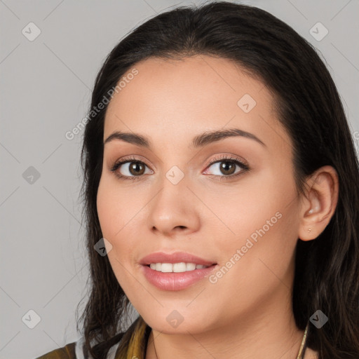 Joyful white young-adult female with long  black hair and brown eyes