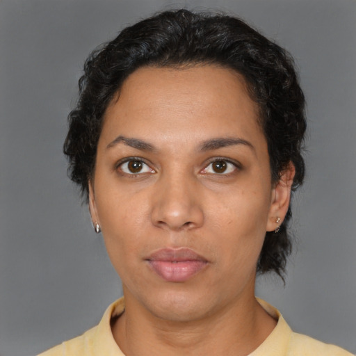 Neutral latino young-adult female with short  black hair and brown eyes