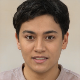 Joyful latino young-adult male with short  brown hair and brown eyes