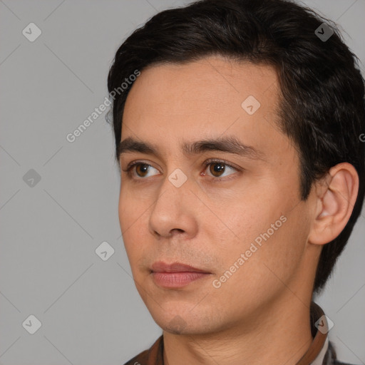 Neutral white young-adult male with short  black hair and brown eyes