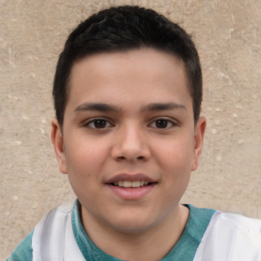 Joyful white child male with short  brown hair and brown eyes