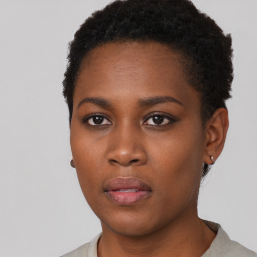 Neutral black young-adult female with short  black hair and brown eyes
