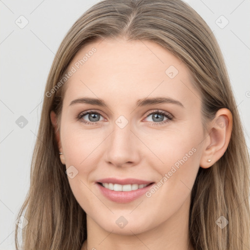 Joyful white young-adult female with long  brown hair and grey eyes