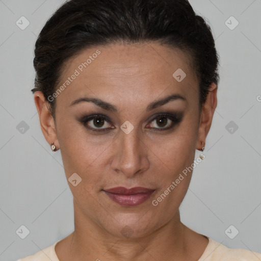 Joyful latino young-adult female with short  brown hair and brown eyes