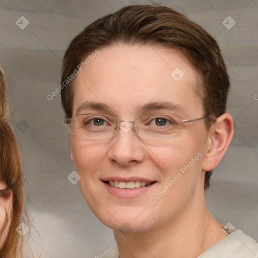 Joyful white adult female with short  brown hair and grey eyes