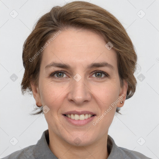 Joyful white adult female with medium  brown hair and grey eyes