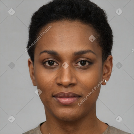 Joyful black young-adult female with short  black hair and brown eyes