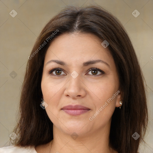 Joyful white adult female with medium  brown hair and brown eyes