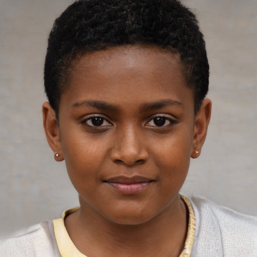 Joyful black child female with short  brown hair and brown eyes
