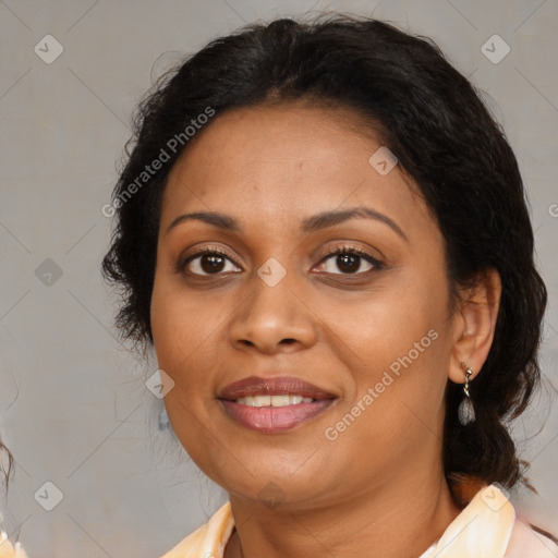 Joyful latino adult female with medium  brown hair and brown eyes