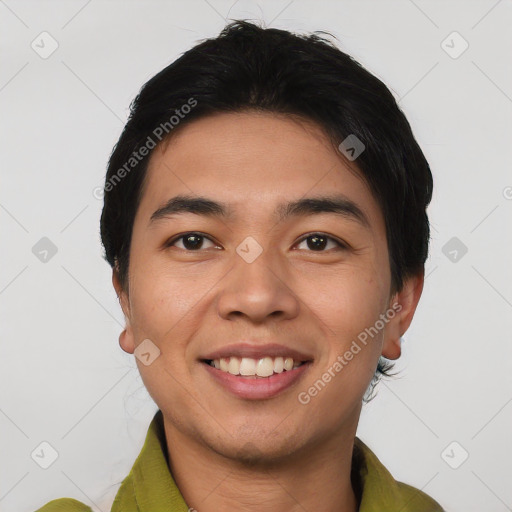 Joyful asian young-adult male with short  black hair and brown eyes