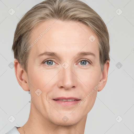 Joyful white adult female with short  brown hair and grey eyes