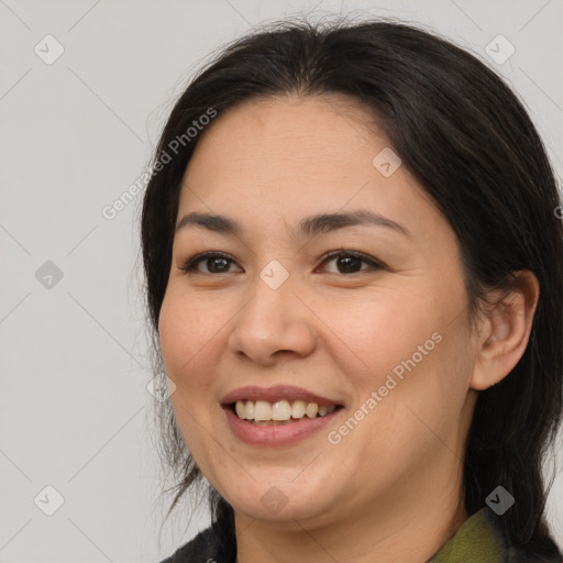 Joyful asian young-adult female with medium  brown hair and brown eyes