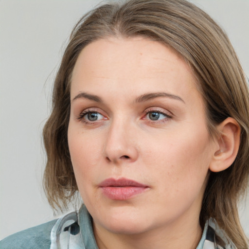 Neutral white young-adult female with medium  brown hair and grey eyes