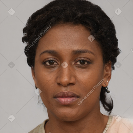 Neutral black young-adult female with short  brown hair and brown eyes