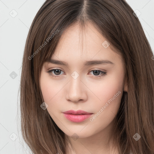 Neutral white young-adult female with long  brown hair and brown eyes