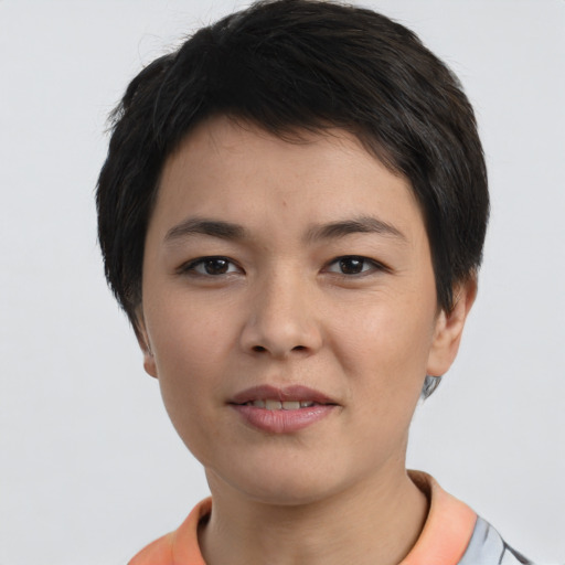 Joyful asian young-adult female with short  black hair and brown eyes