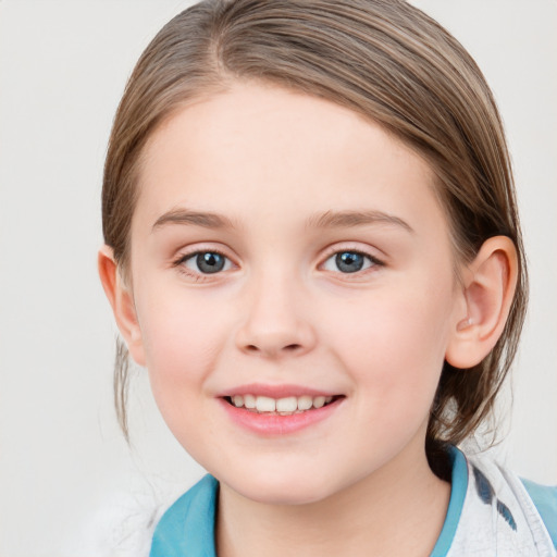 Joyful white child female with medium  brown hair and blue eyes