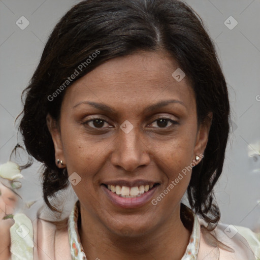 Joyful white adult female with medium  brown hair and brown eyes