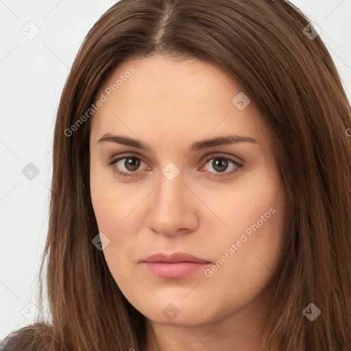 Neutral white young-adult female with long  brown hair and brown eyes