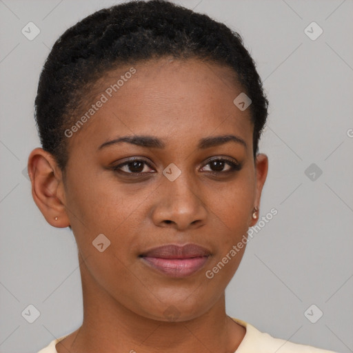 Joyful black young-adult female with short  brown hair and brown eyes