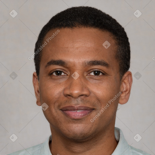 Joyful latino adult male with short  black hair and brown eyes