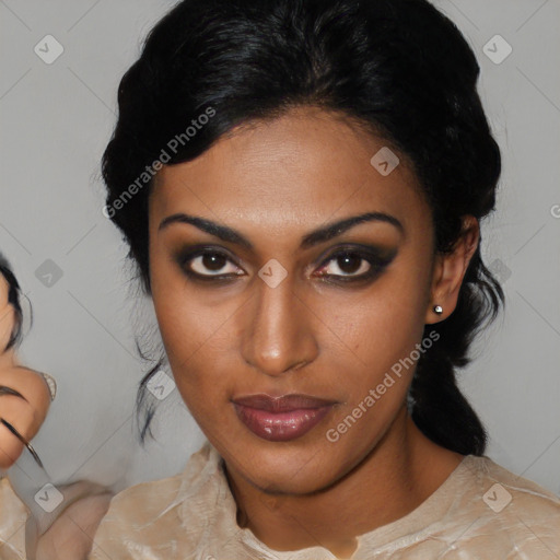 Joyful black young-adult female with medium  black hair and brown eyes