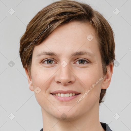 Joyful white young-adult female with short  brown hair and grey eyes