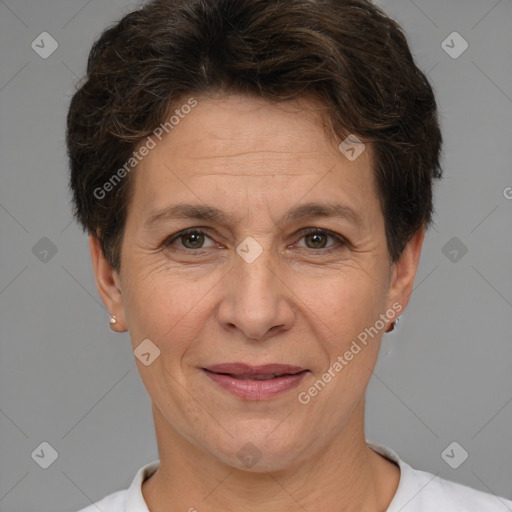 Joyful white adult female with short  brown hair and brown eyes