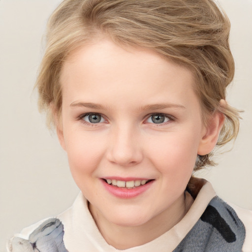 Joyful white child female with medium  brown hair and blue eyes