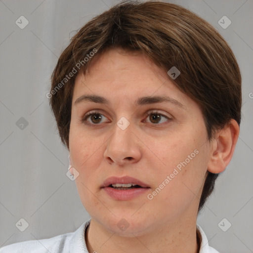 Joyful white adult female with short  brown hair and brown eyes