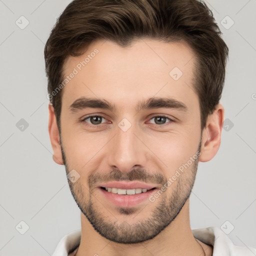 Joyful white young-adult male with short  brown hair and brown eyes