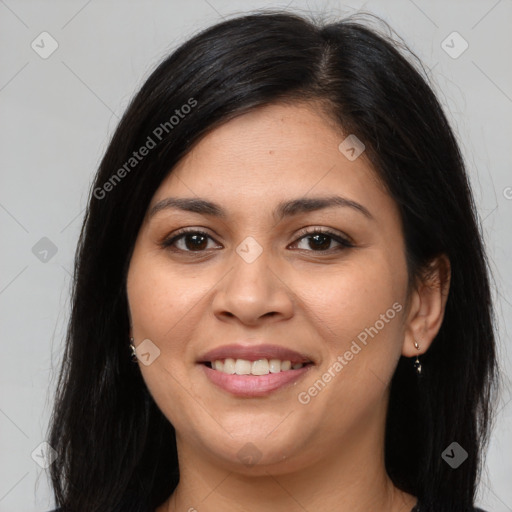 Joyful latino young-adult female with long  brown hair and brown eyes