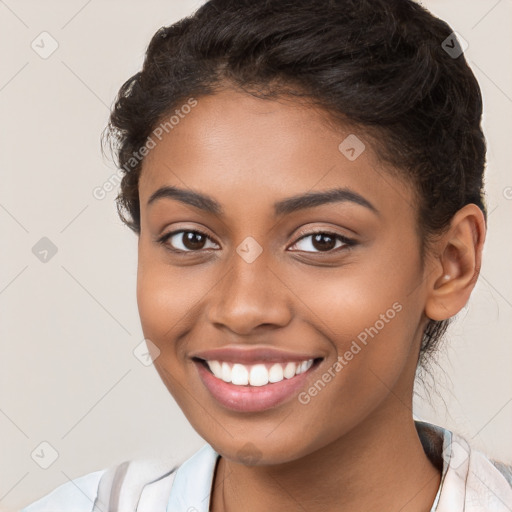 Joyful latino young-adult female with short  brown hair and brown eyes