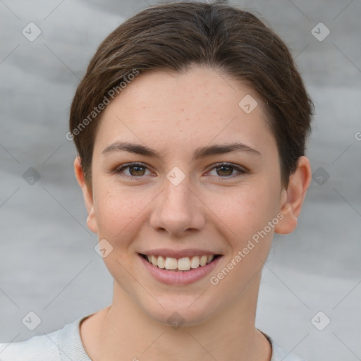 Joyful white young-adult female with short  brown hair and grey eyes