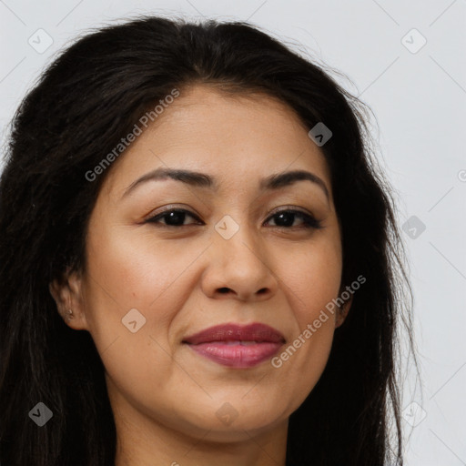 Joyful latino young-adult female with long  brown hair and brown eyes