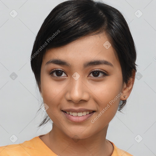 Joyful latino young-adult female with medium  black hair and brown eyes