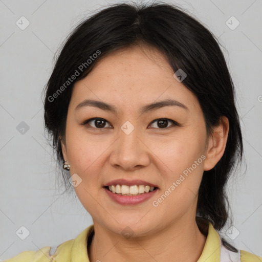 Joyful latino young-adult female with medium  brown hair and brown eyes