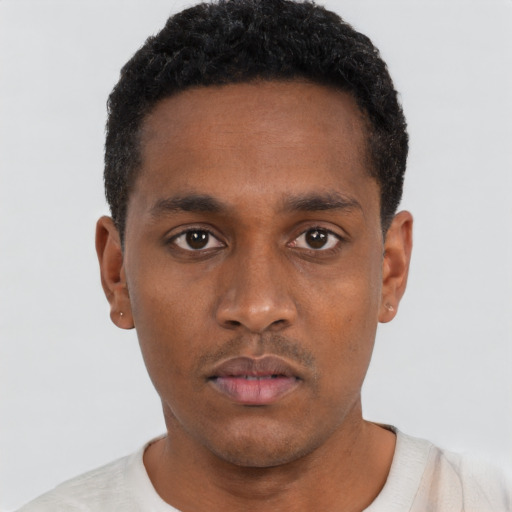 Neutral black young-adult male with short  black hair and brown eyes