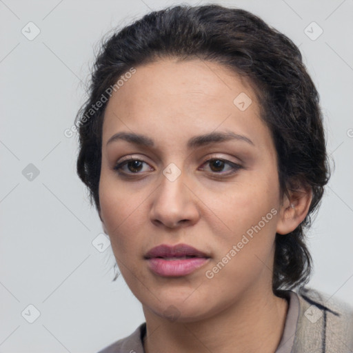 Joyful white young-adult female with medium  black hair and brown eyes