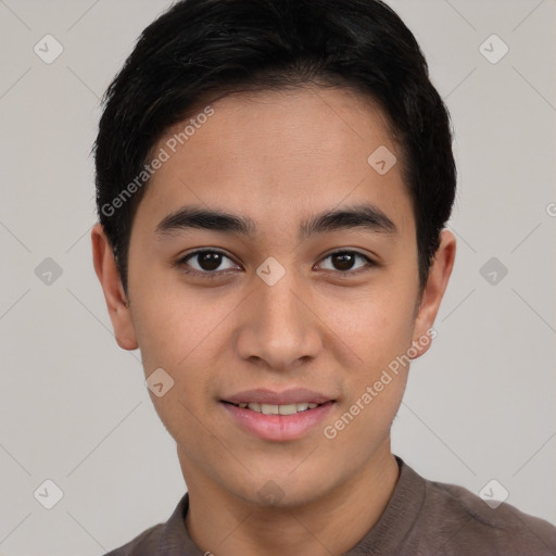 Joyful asian young-adult male with short  brown hair and brown eyes