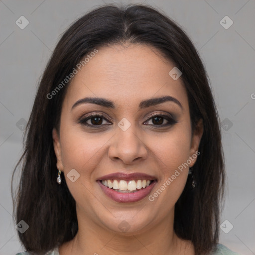 Joyful white young-adult female with long  brown hair and brown eyes