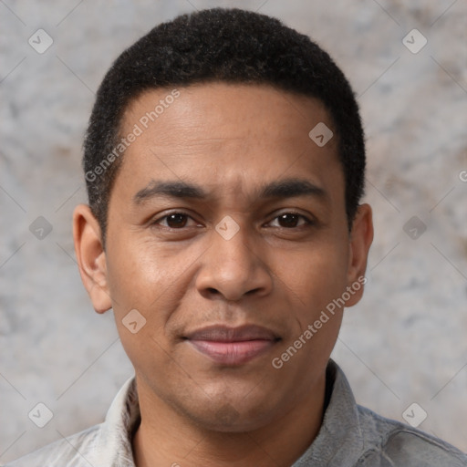 Joyful latino young-adult male with short  brown hair and brown eyes