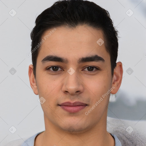 Joyful asian young-adult male with short  black hair and brown eyes