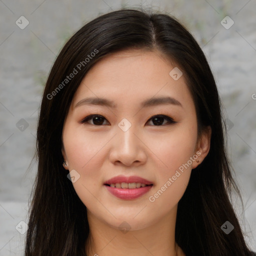 Joyful asian young-adult female with long  brown hair and brown eyes